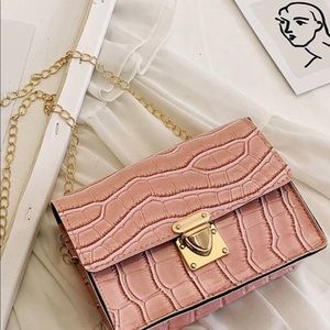 Croc embossed flip chain broad body bag